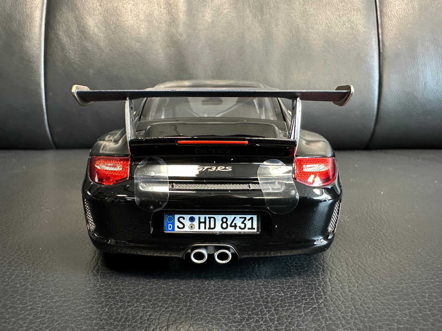 Porsche 911 GT3 RS black/gold 2009 1:18 Norev 187563 Порше 911 ГТ3 РС черен/златен