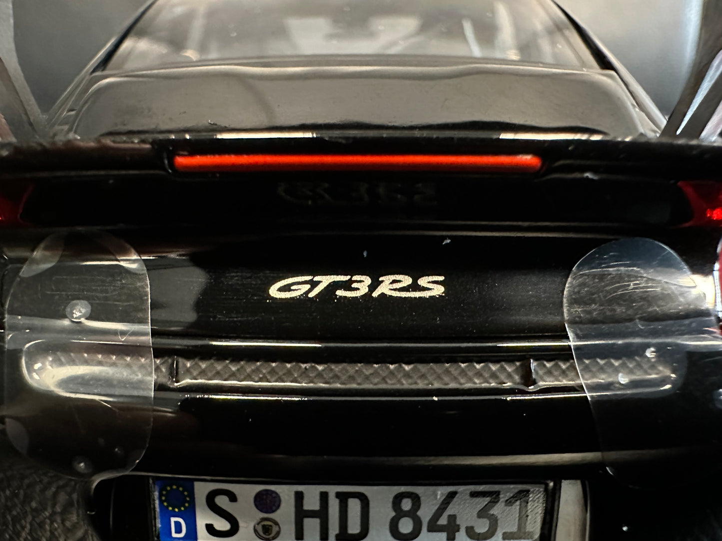 Porsche 911 GT3 RS black/gold 2009 1:18 Norev 187563 Порше 911 ГТ3 РС черен/златен